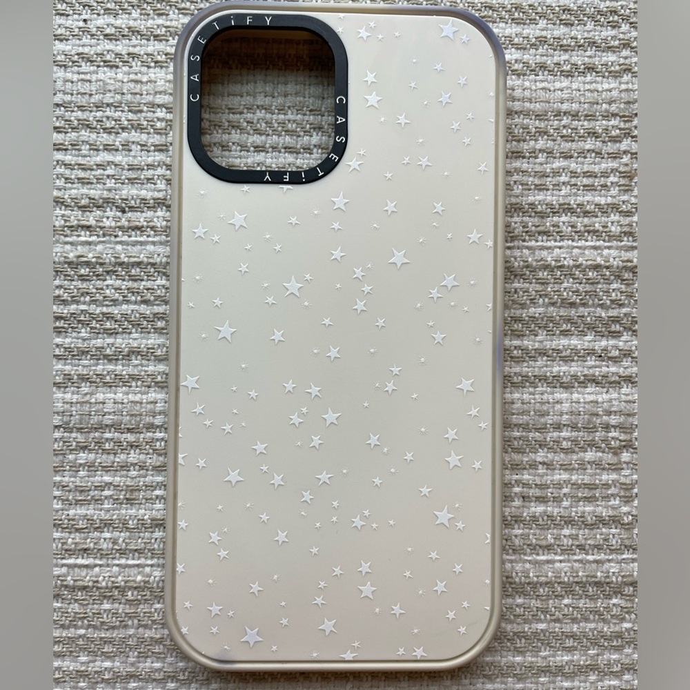 Casetify creamish star iPhone holder. iPhone 12 ProMax.